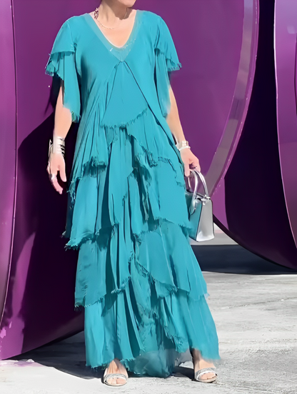 Luna Moda | Zwiewna sukienka maxi z artystycznym akcentem